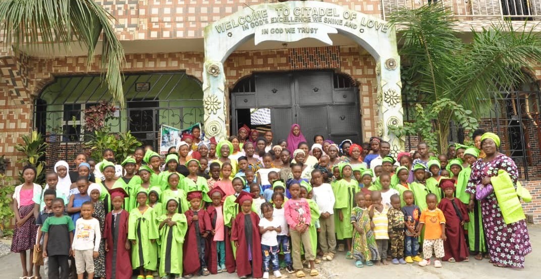Children learning and smiling at GLTIRF Free School and Orphanage in Nasarawa State, Nigeria